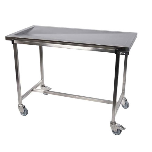 Table chirurgie plateau 1 évacuation en diamant V sur 4 roues dont 2 avec freins
